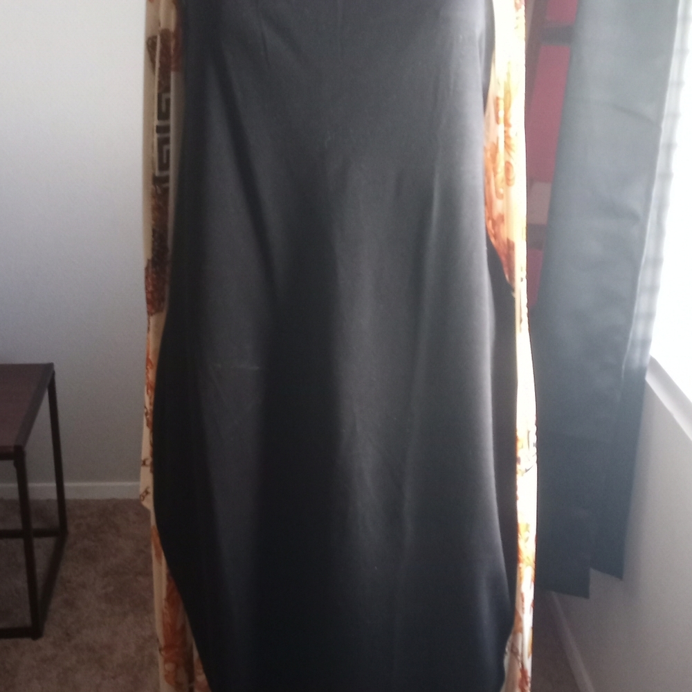 A black dress and a long sleeve multicolor